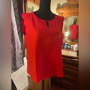 Red sleeveless blouse